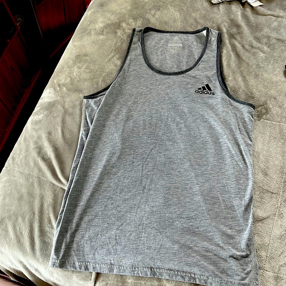 Mens adidas tank top selling for 13$